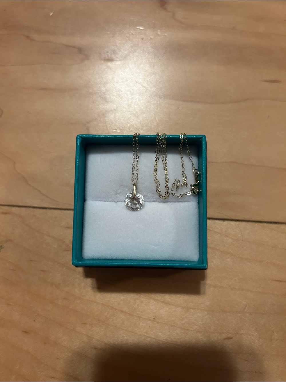Elegant 14k Gold Necklace with Diamond-shaped pendant.